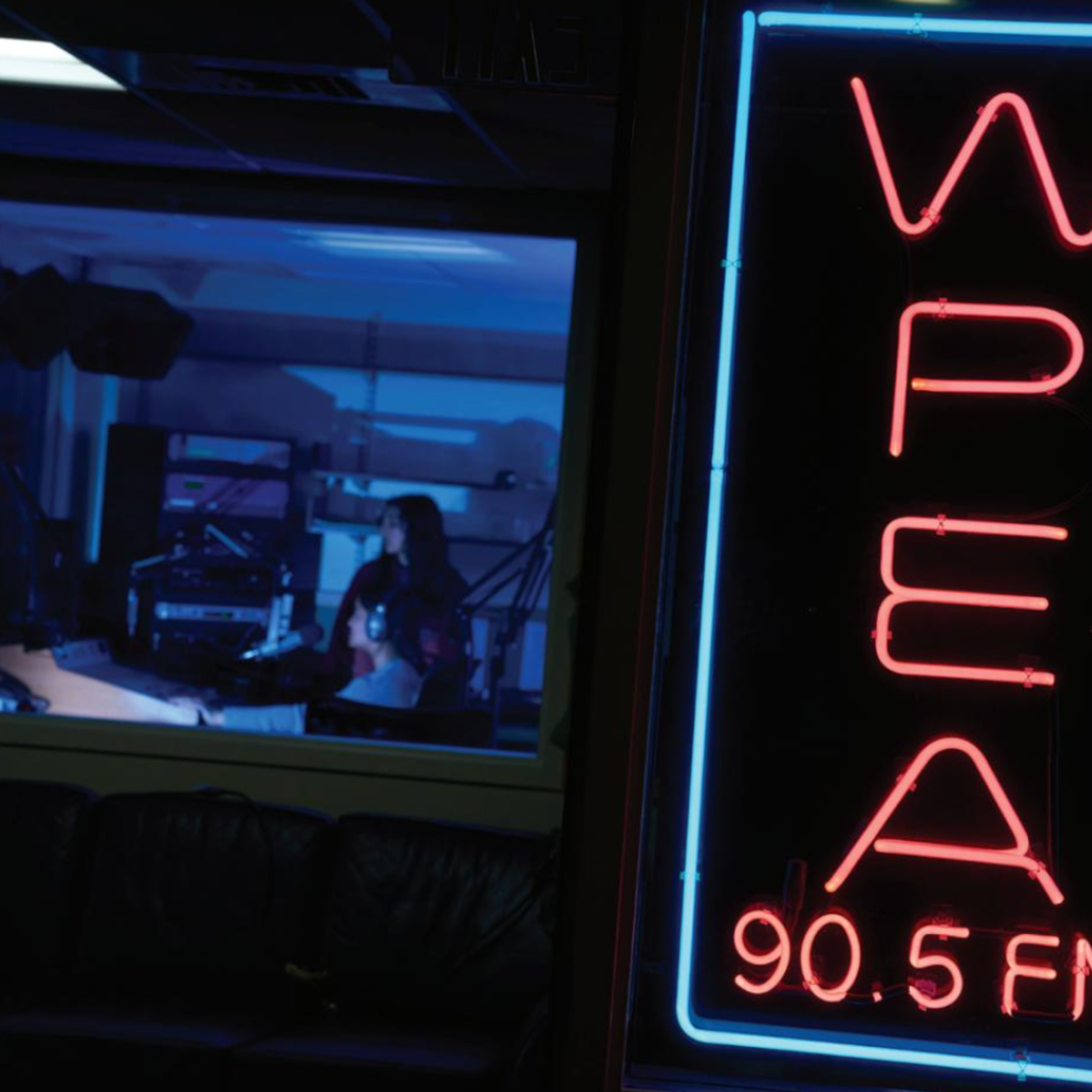 Neon signs and a radio booth.