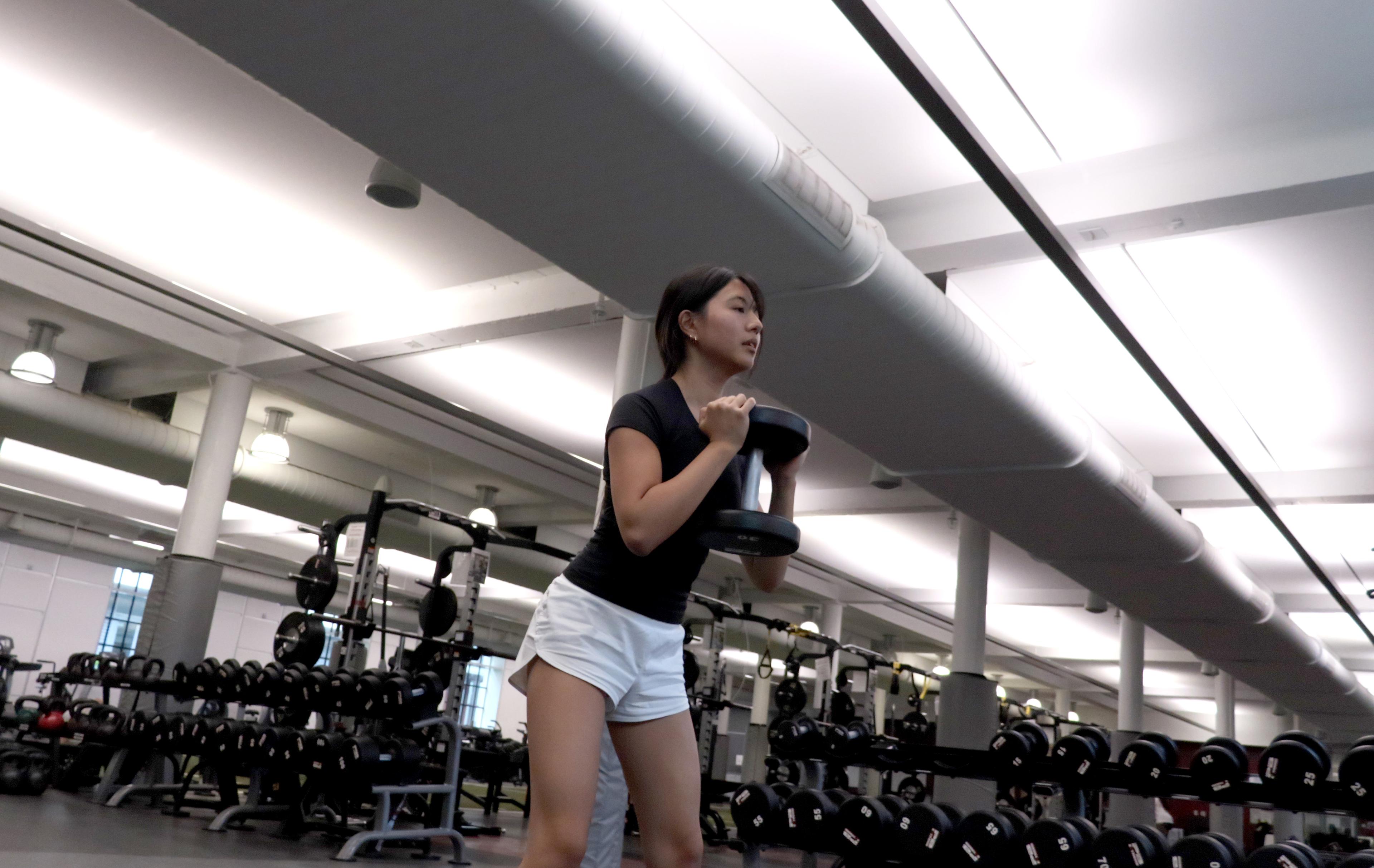 girl with dumbbell
