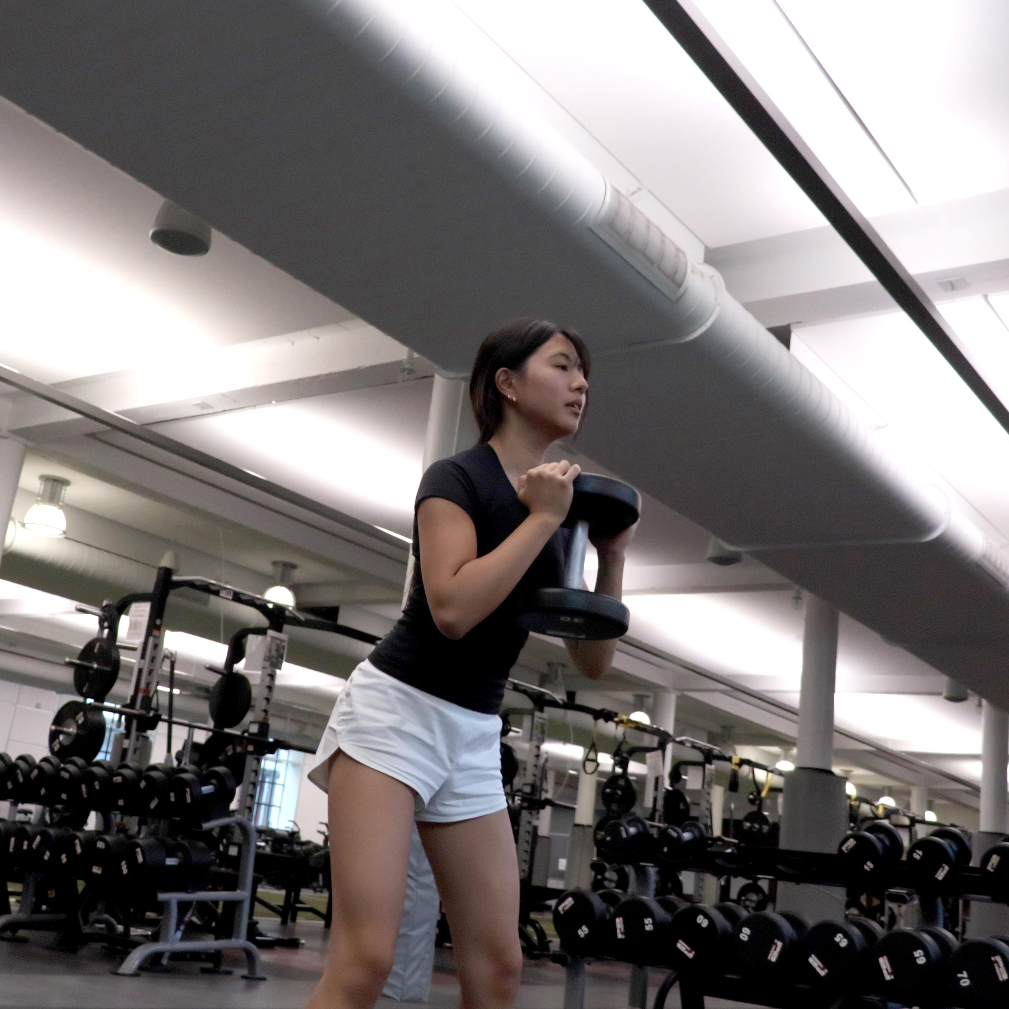 girl with dumbbell