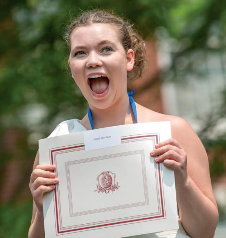 girl holding diploma