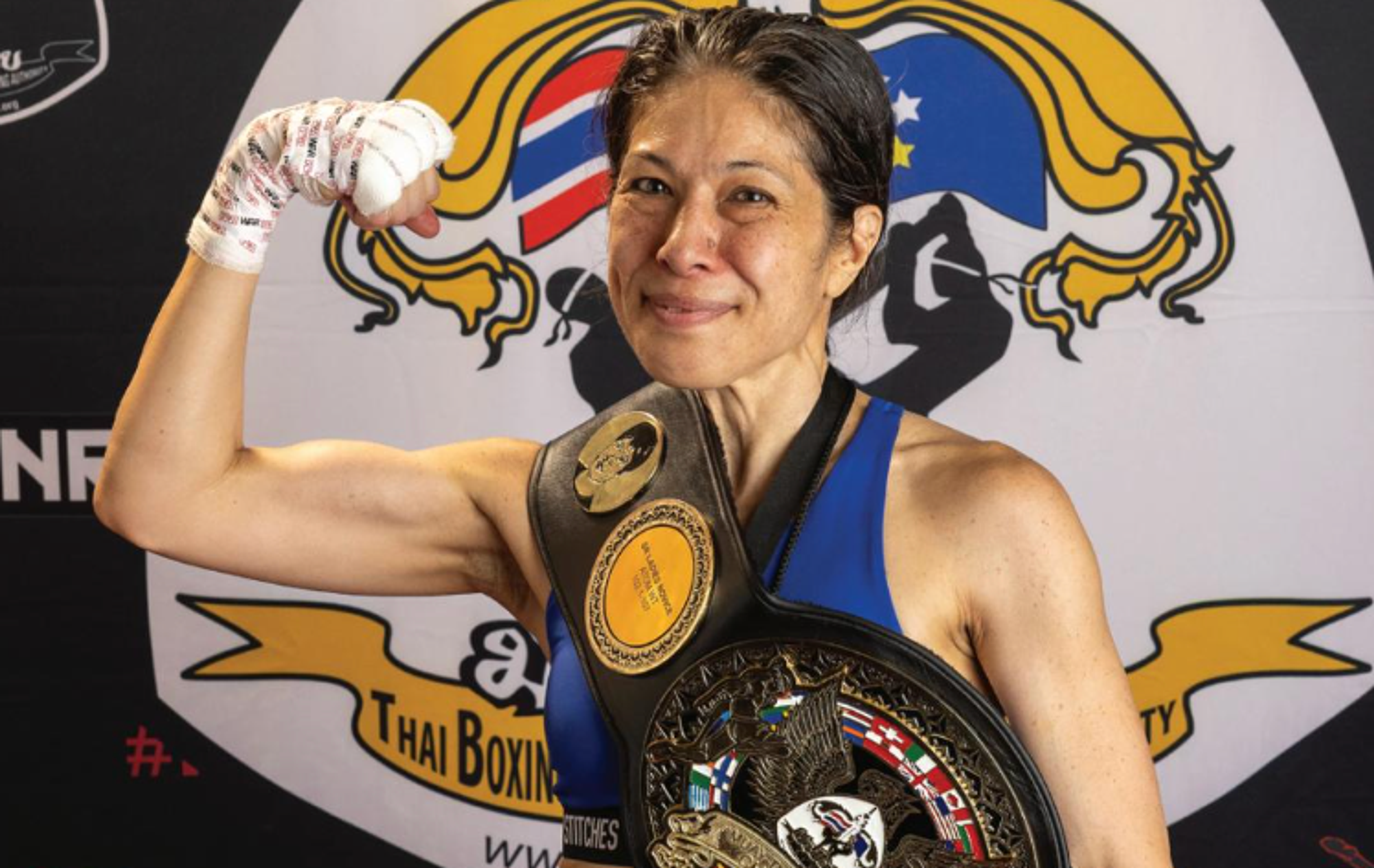 woman with boxing outfit and belt