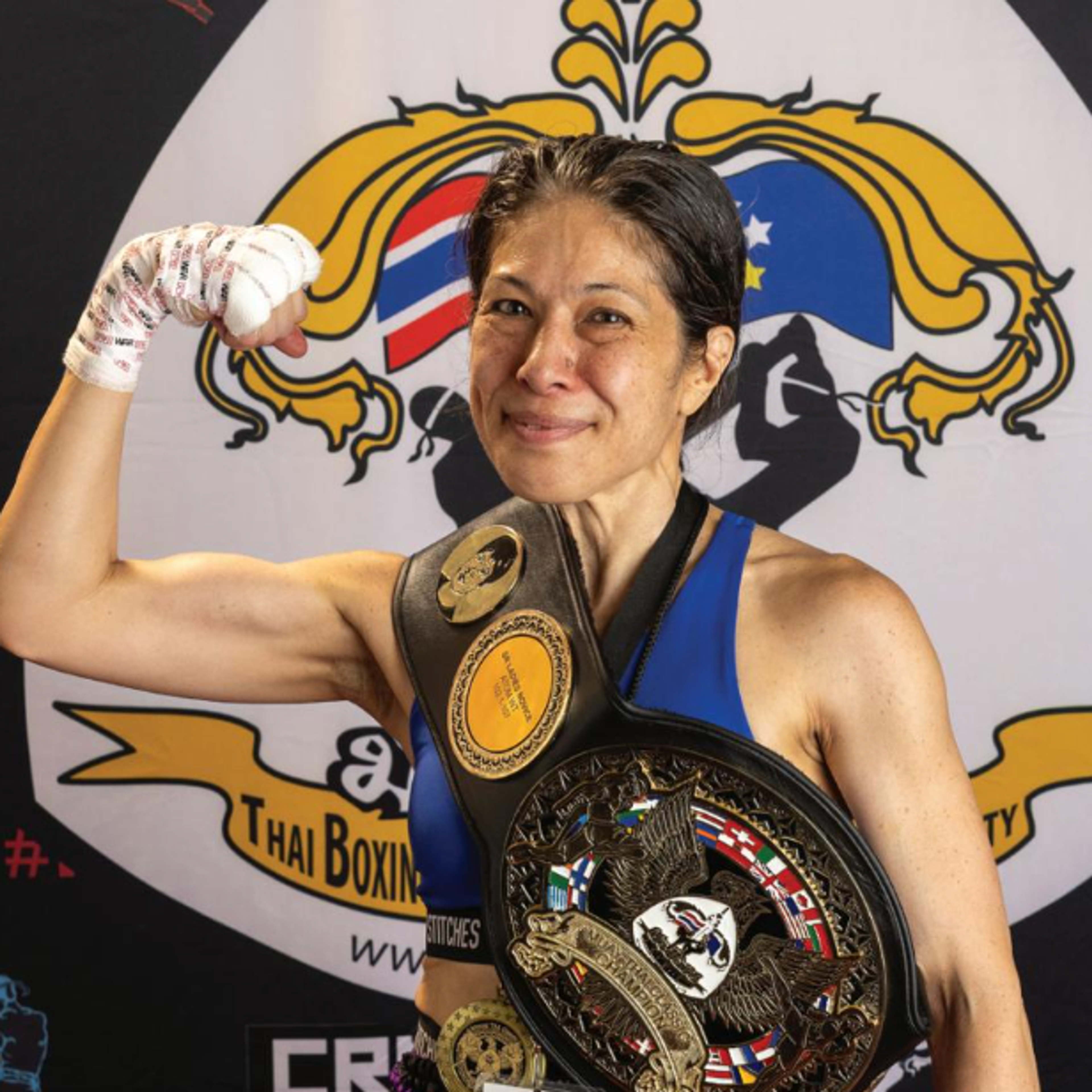 woman with boxing outfit and belt