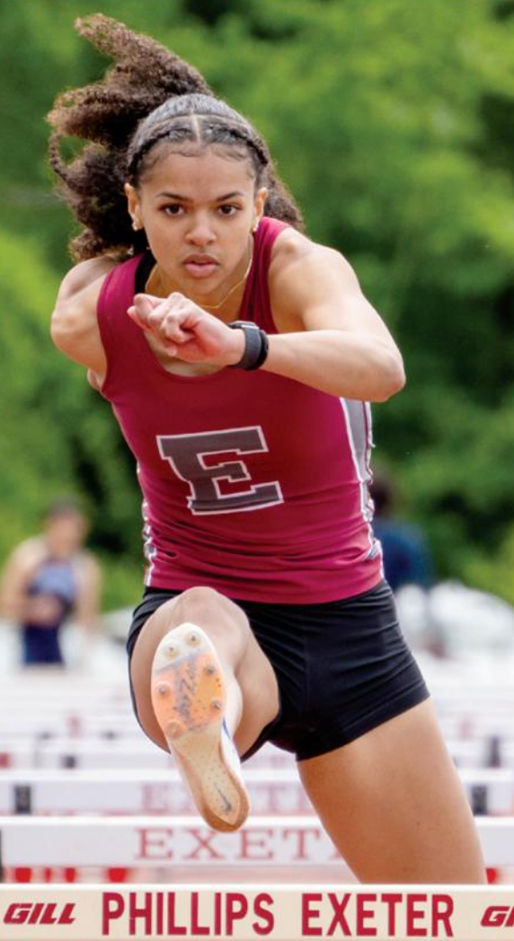 girl jumping hurdles