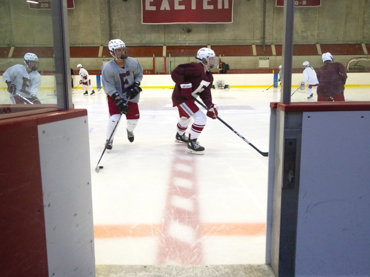 Hockey players skating