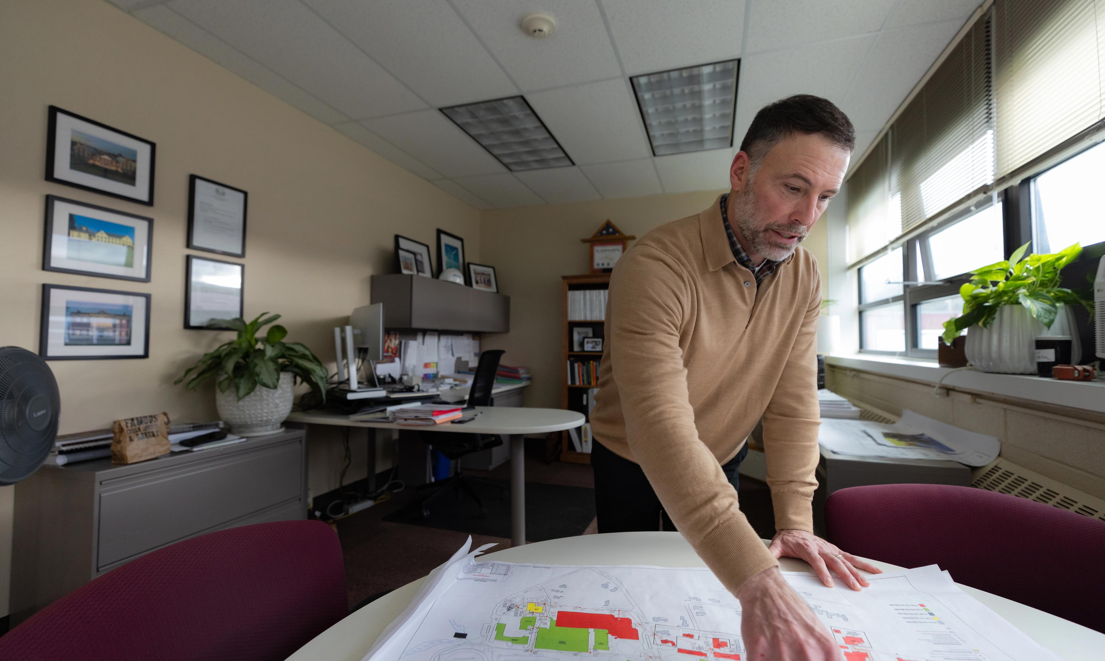 At the office with Director of Facilities Management Mark Leighton