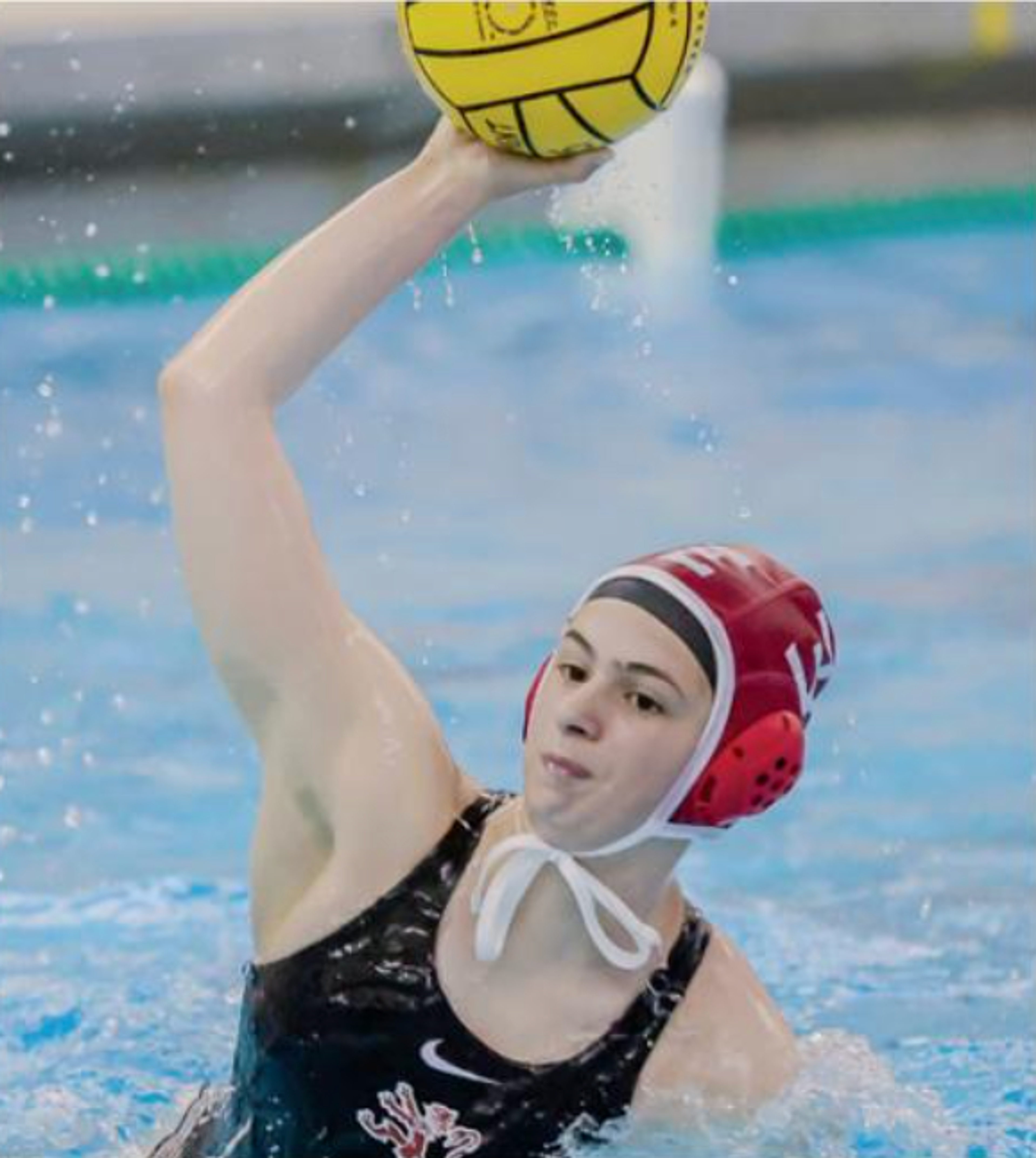 girl playing water polo