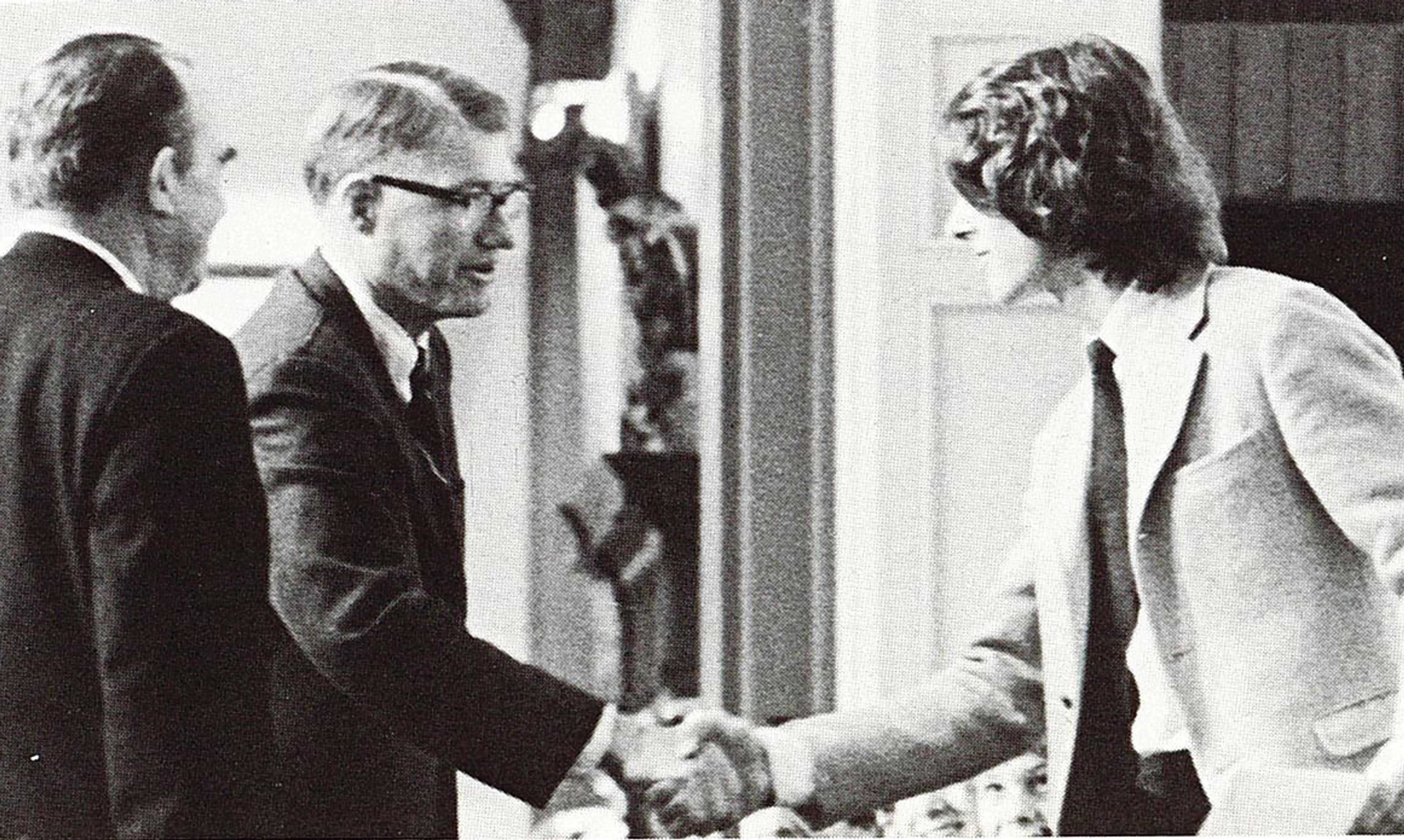 Student shaking hands at graduation in 1970