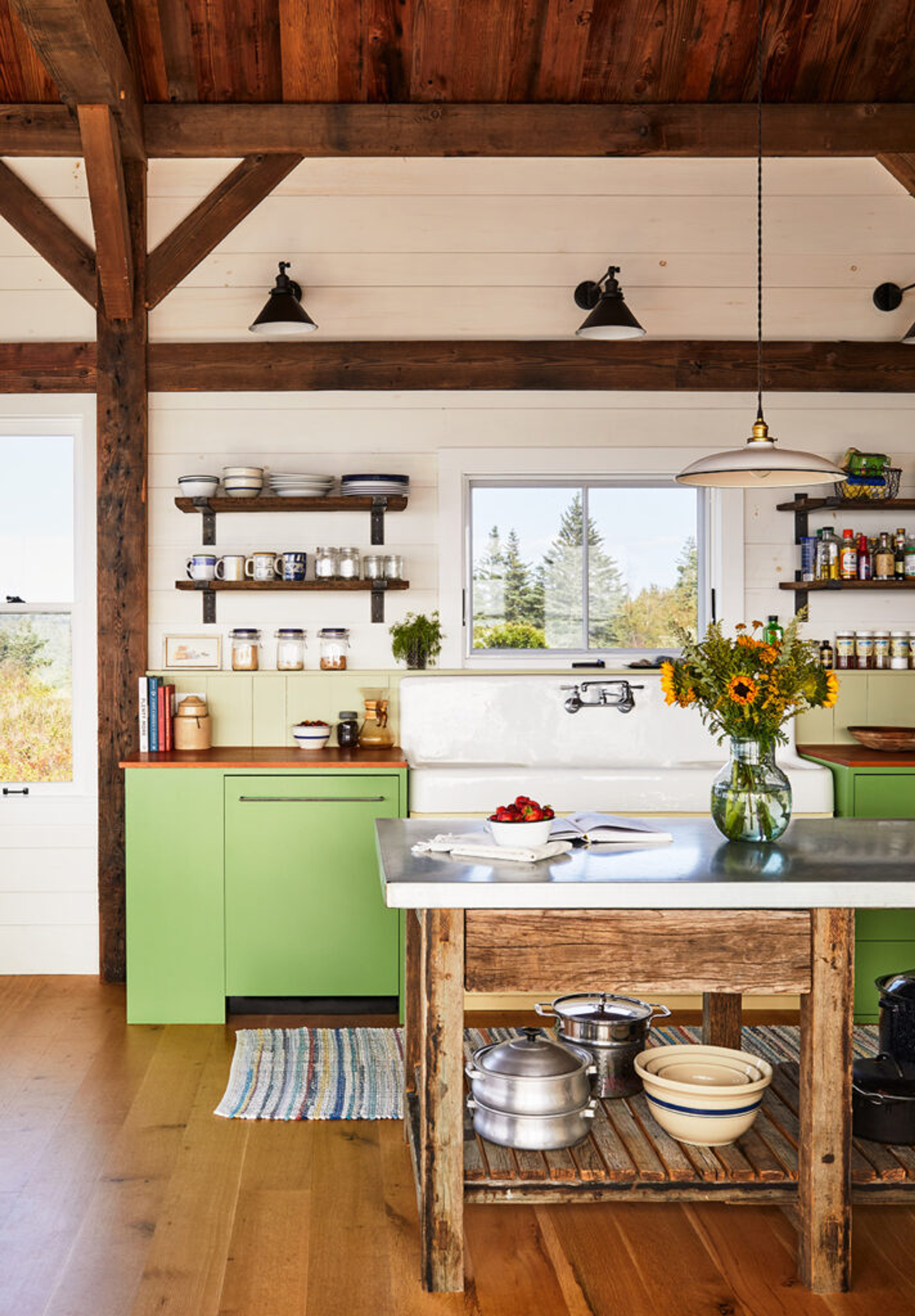 Kitchen with a wooden butchers block and clean cabinets