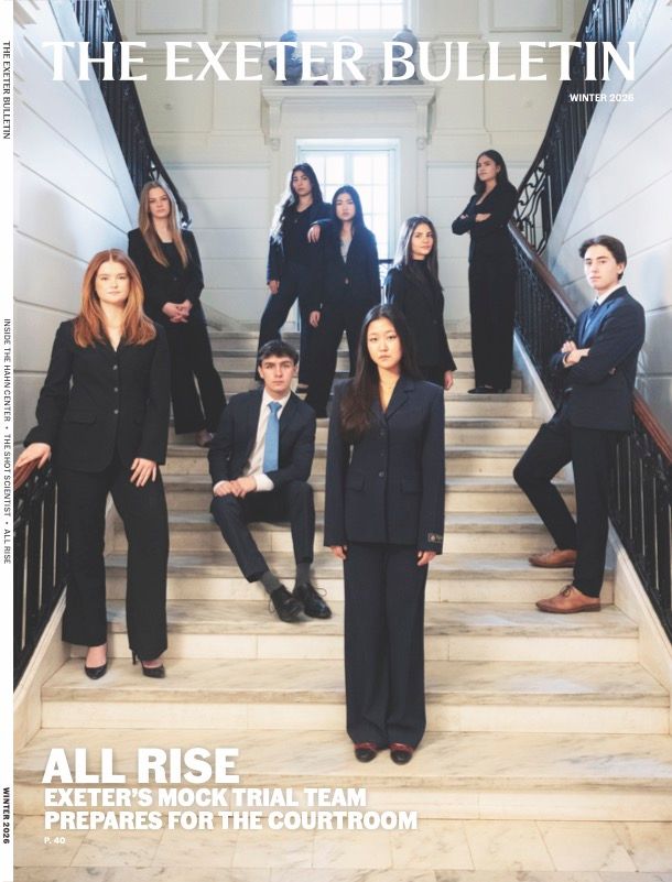 People in suits on stairs