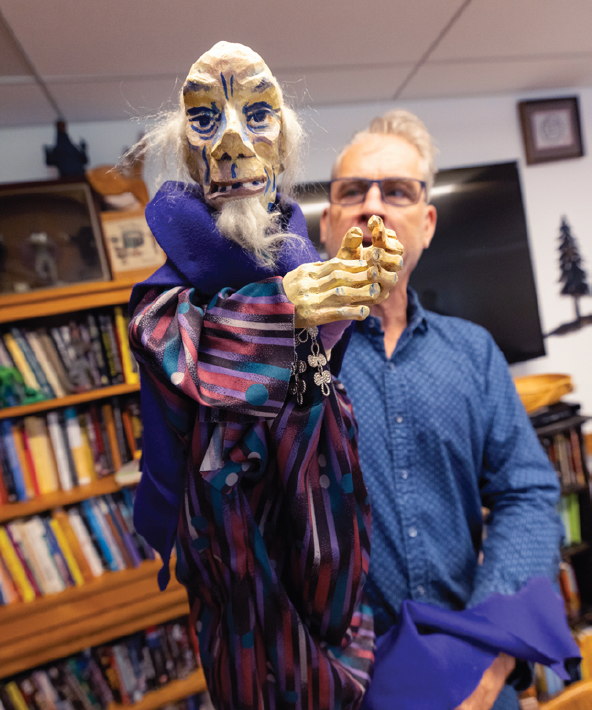 Man with puppet.