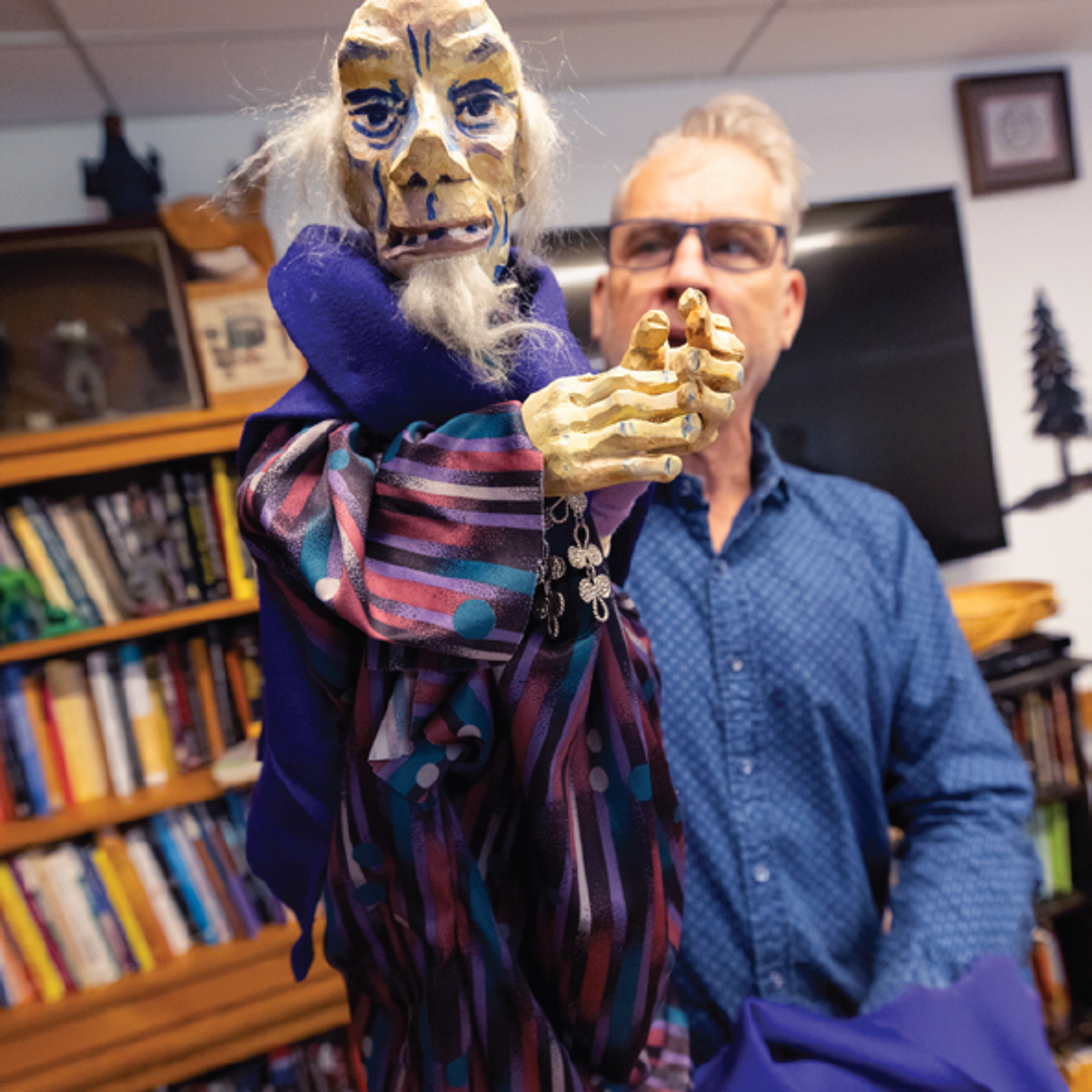 Man with puppet.