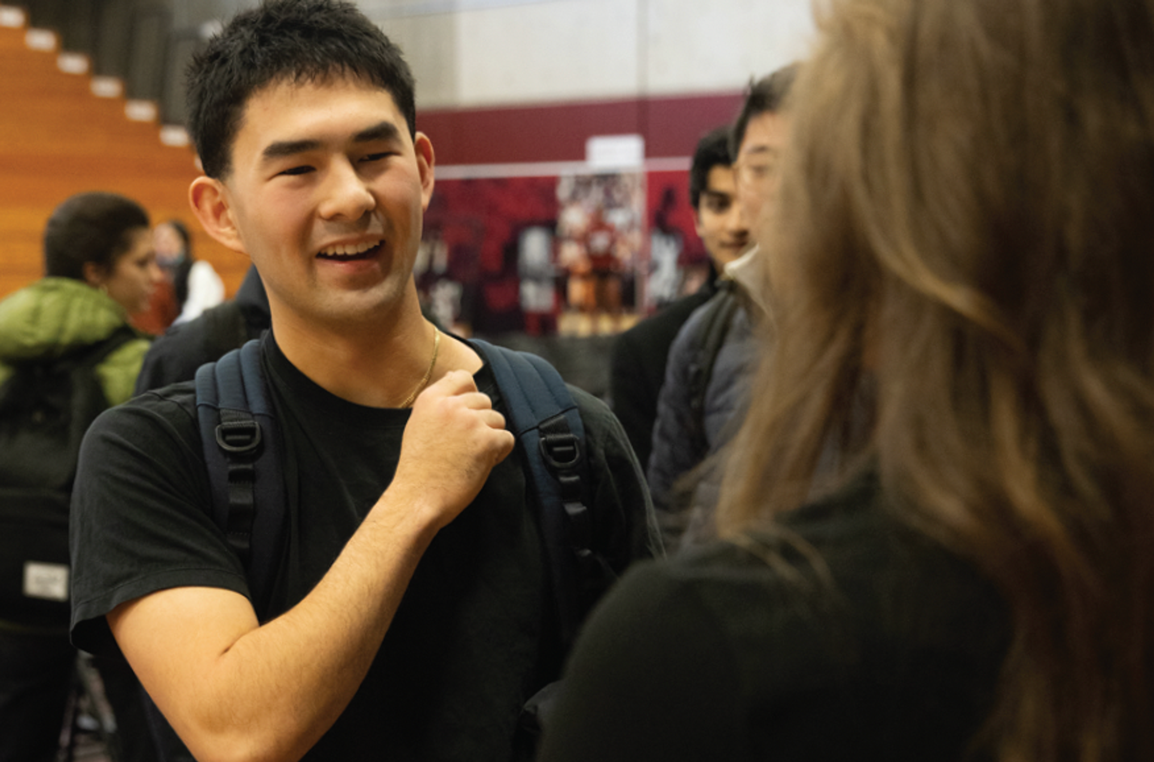 person with fist to the chest