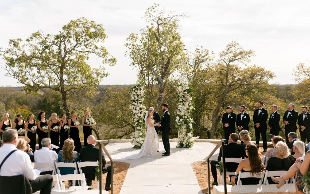 Bluff ceremony site under the oaks at Dos Palomas Ranch, a Boerne, Texas wedding venue