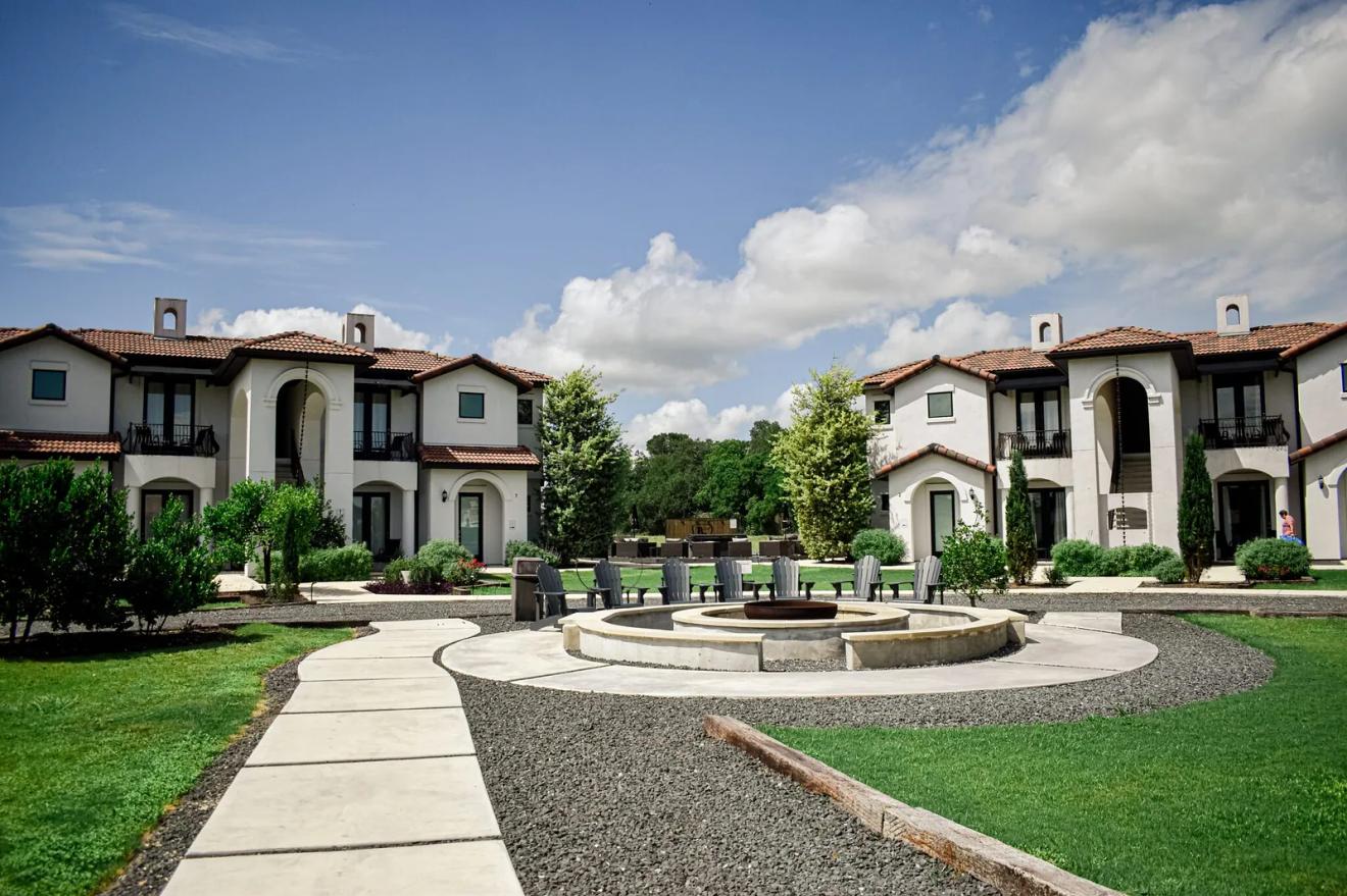 Villa suites and fire pit courtyard at the Barons Creek Vineyards estate in Fredericksburg, Texas