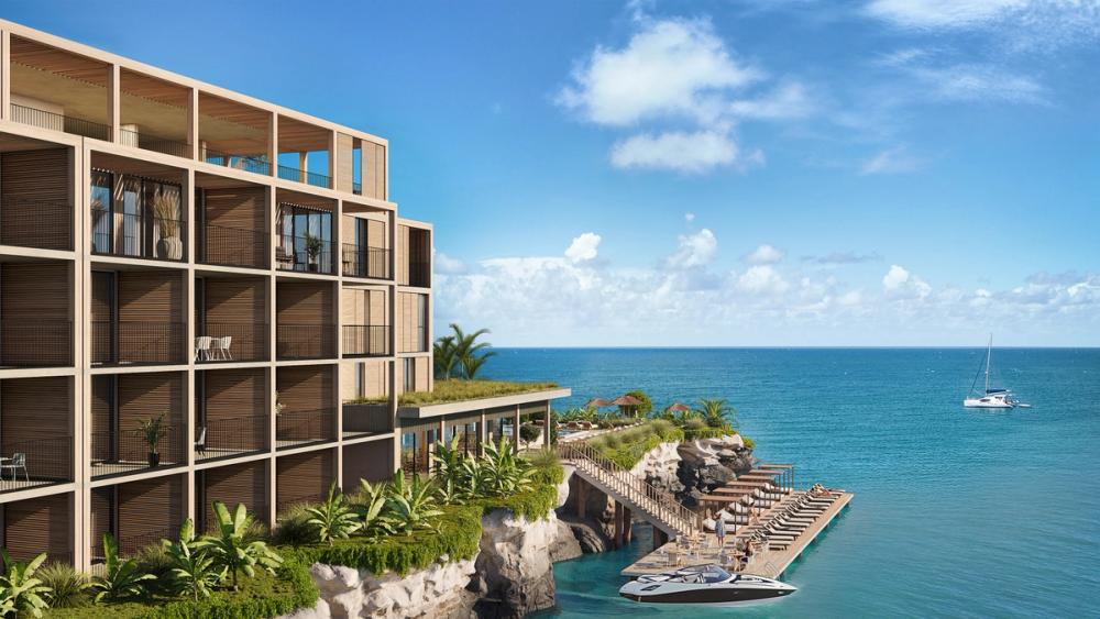 View of One True Blue Beach Hotel from the pool terrace