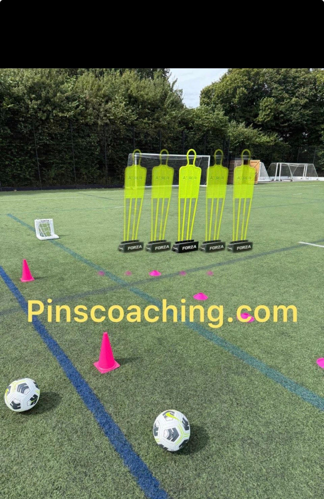 Football pitch lit up with spotlights