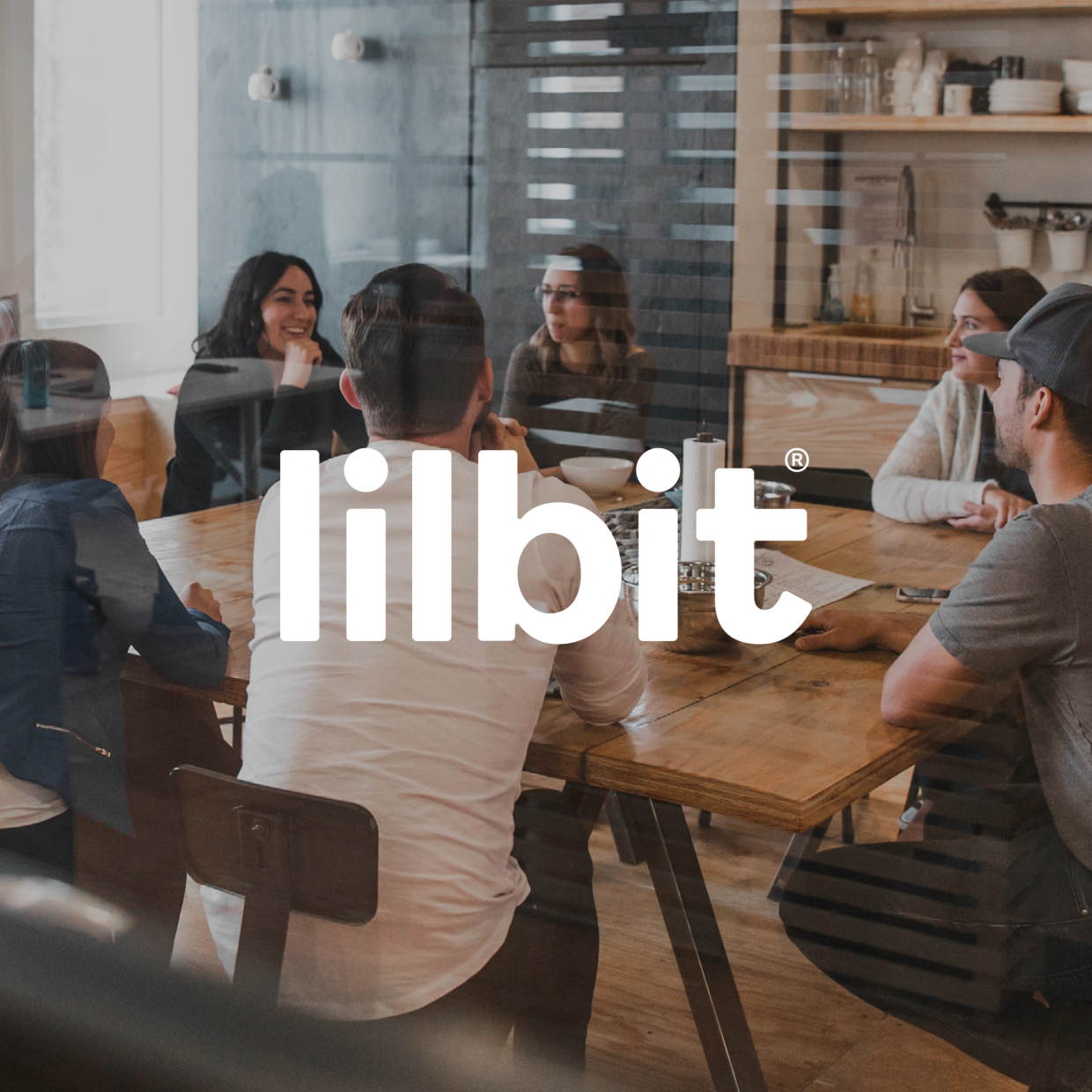 Lilbit-teamet i arbeidsmøte rundt et bord
