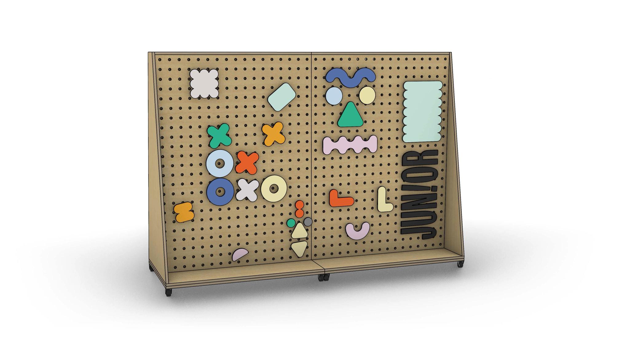 Interactive kids’ pegboard wall with colorful geometric shapes and the word ‘JUNIOR,’ designed for creative play at Kunstsilo.