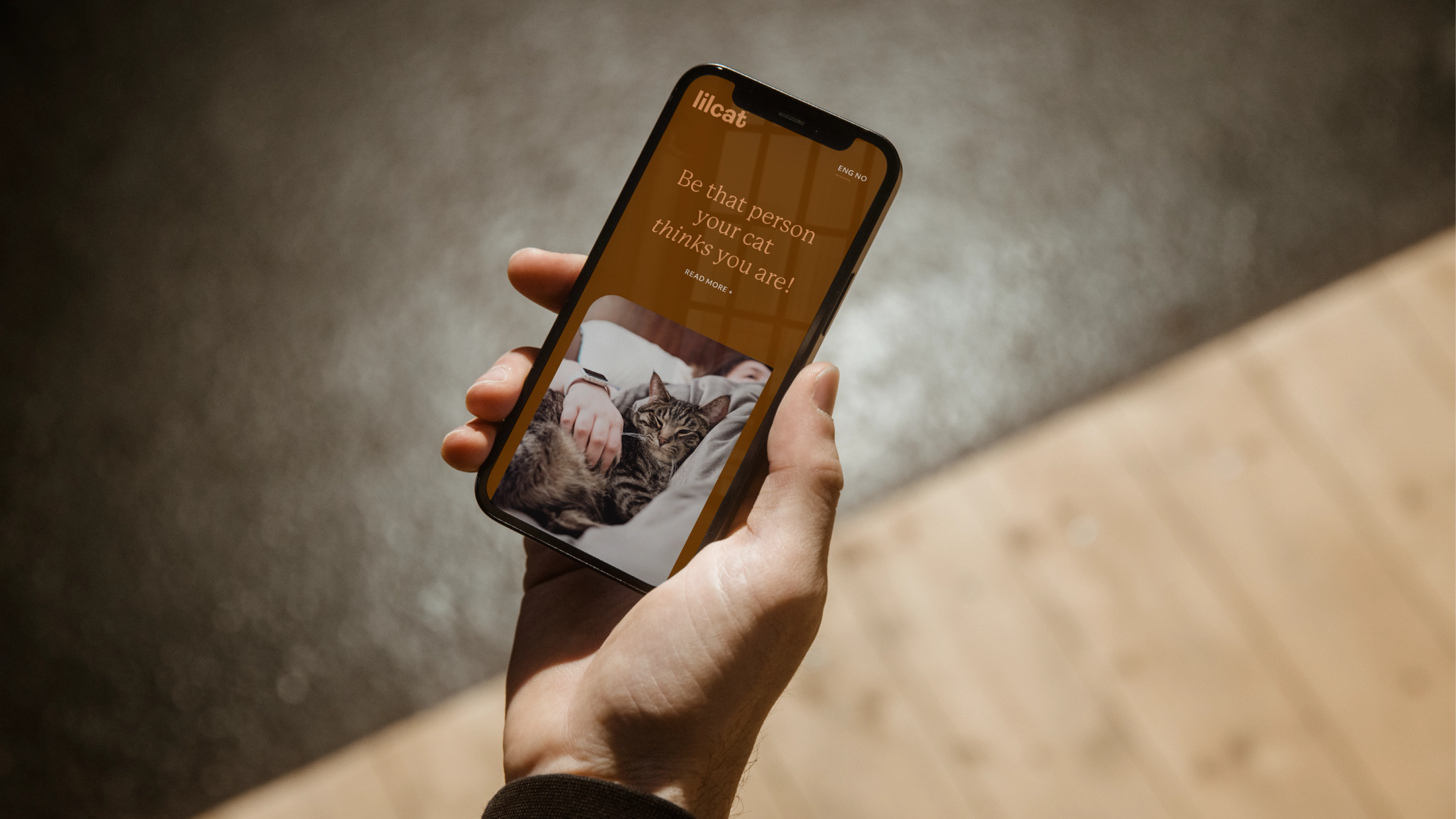 Lildog app shown on mobile in hand