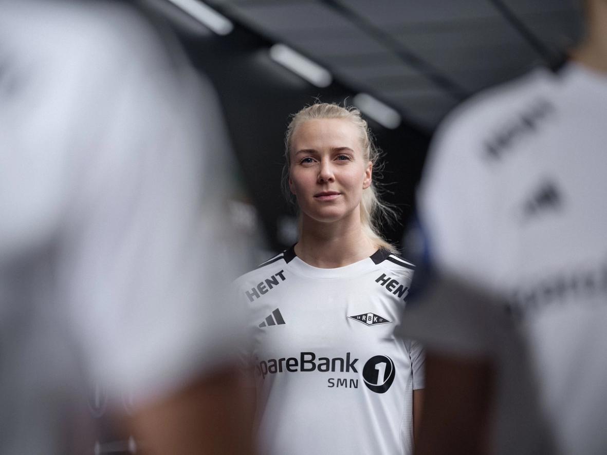 Rosenborg BK player in the 2024 home kit, photographed in the locker-room tunnel as part of the new visual identity campaign.