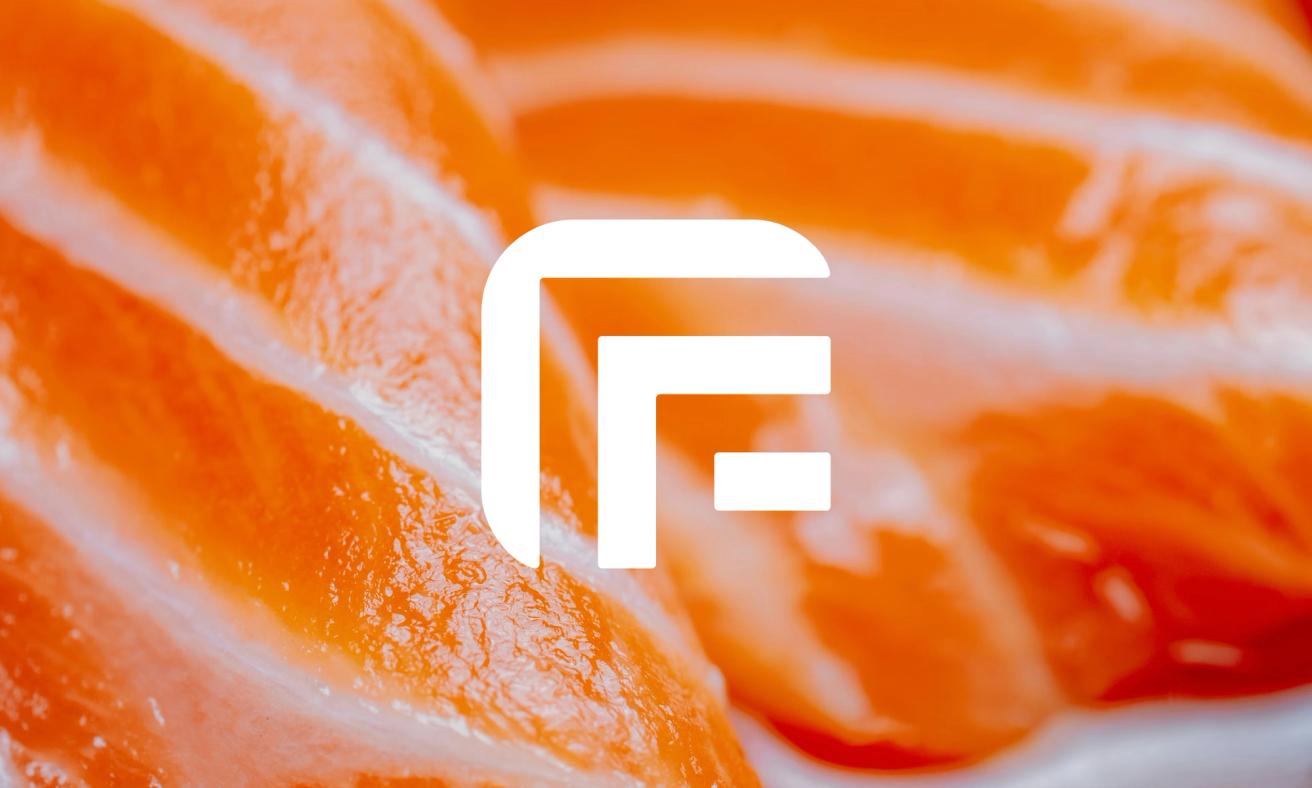 A white geometric F logo overlaid on a close-up of fresh salmon fillets — by Nonspace