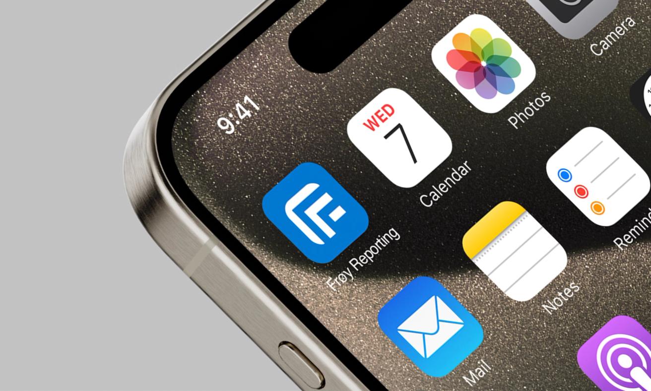 iPhone home screen showing the Frøy Reporting app icon alongside native iOS apps like Calendar, Photos and Mail — by Nonspace