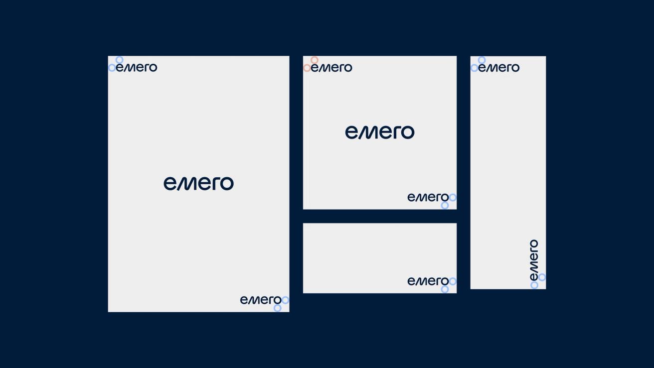 Various sizes of white cards displaying the Emero logo with decorative circular elements on a dark navy background — by Nonspace