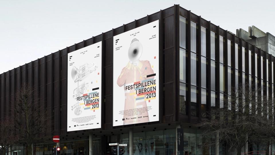 To store plakater for Festspillene i Bergen 2013 med trompetmotiv og figur uten ansikt på bygningsfasade — av Nonspace