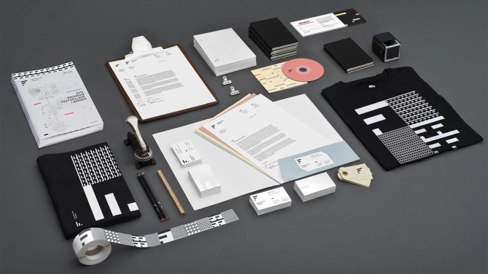 A brand identity system showing stationery, business cards, t-shirt, program booklet, CD, and tape for Festspillene i Bergen — by Nonspace