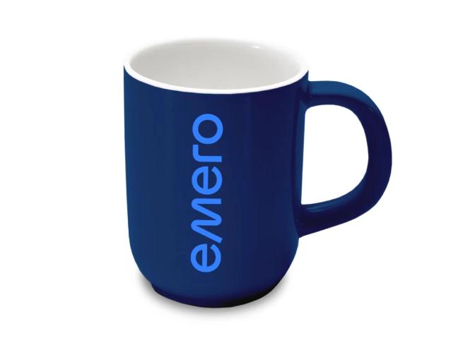A dark blue ceramic mug with white interior featuring the word "emero" in light blue vertical text — by Nonspace