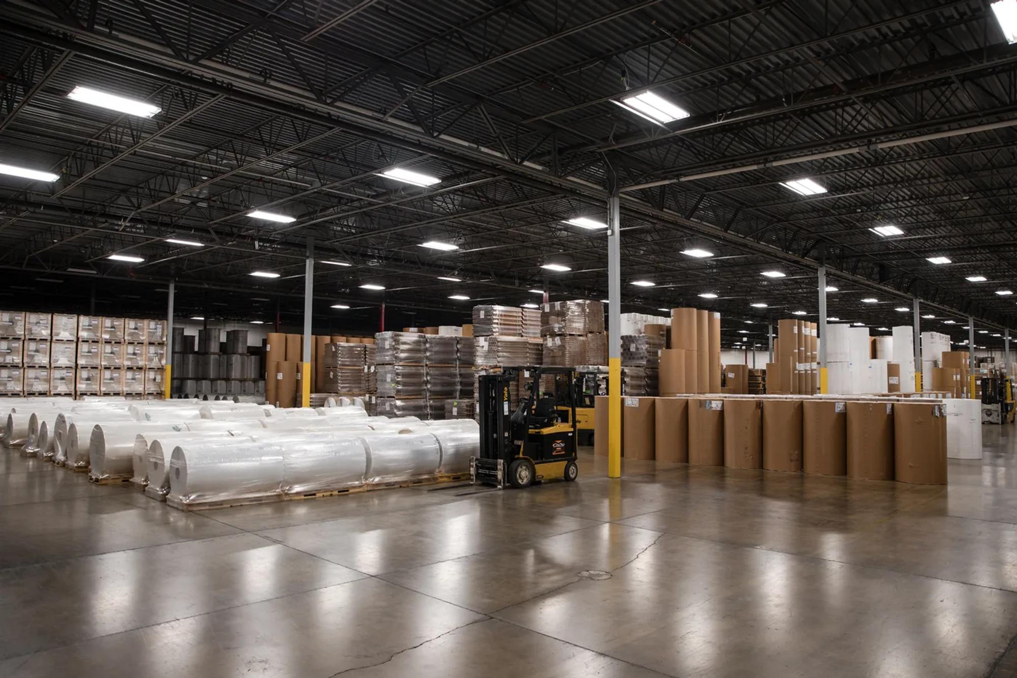 Interior of the Dick Lavy warehouse with a forklift and staged freight