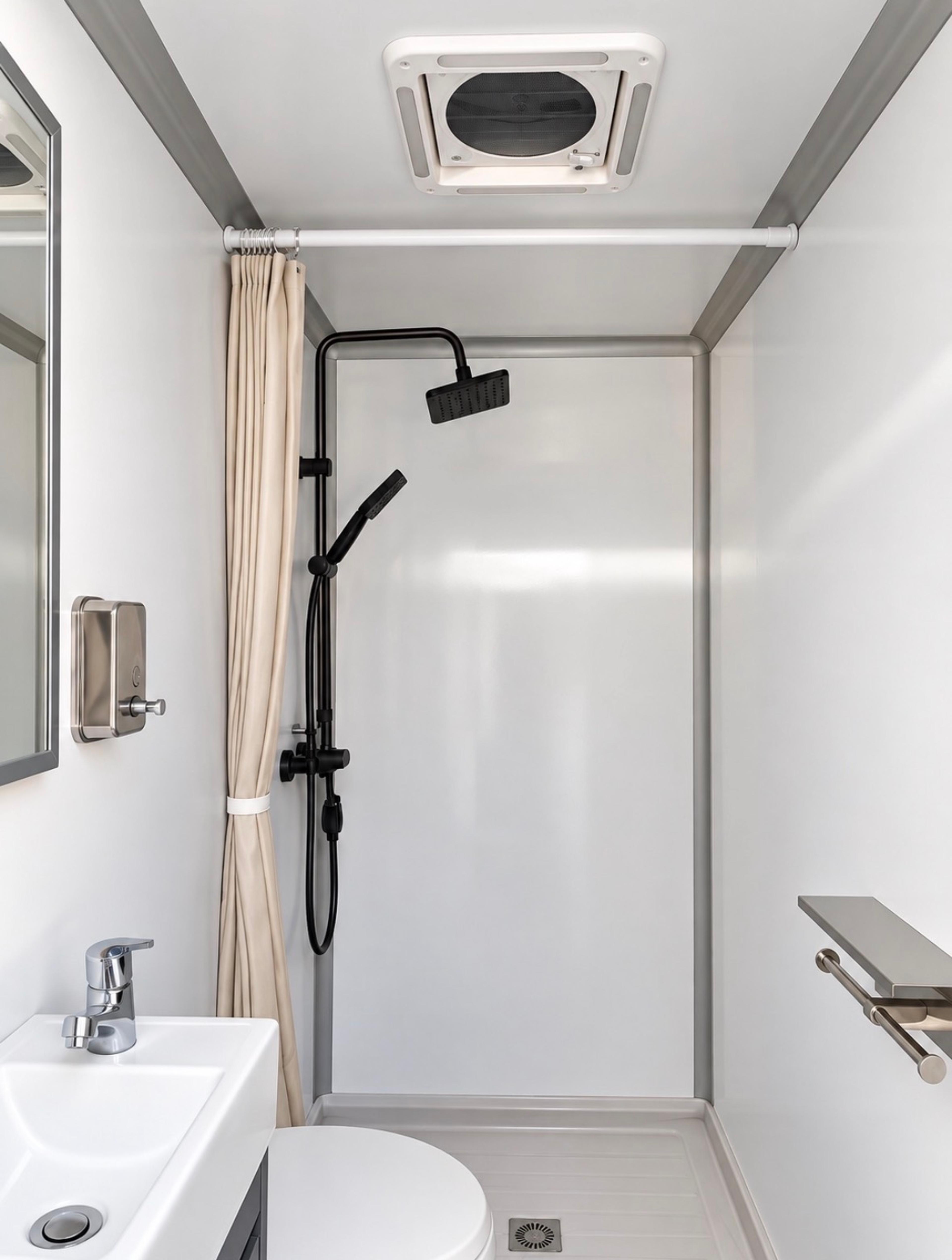 2-Stall + Shower shower fixture close-up with rain head and handheld wand