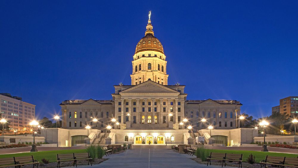 The Kansas State Capitol illuminated at night