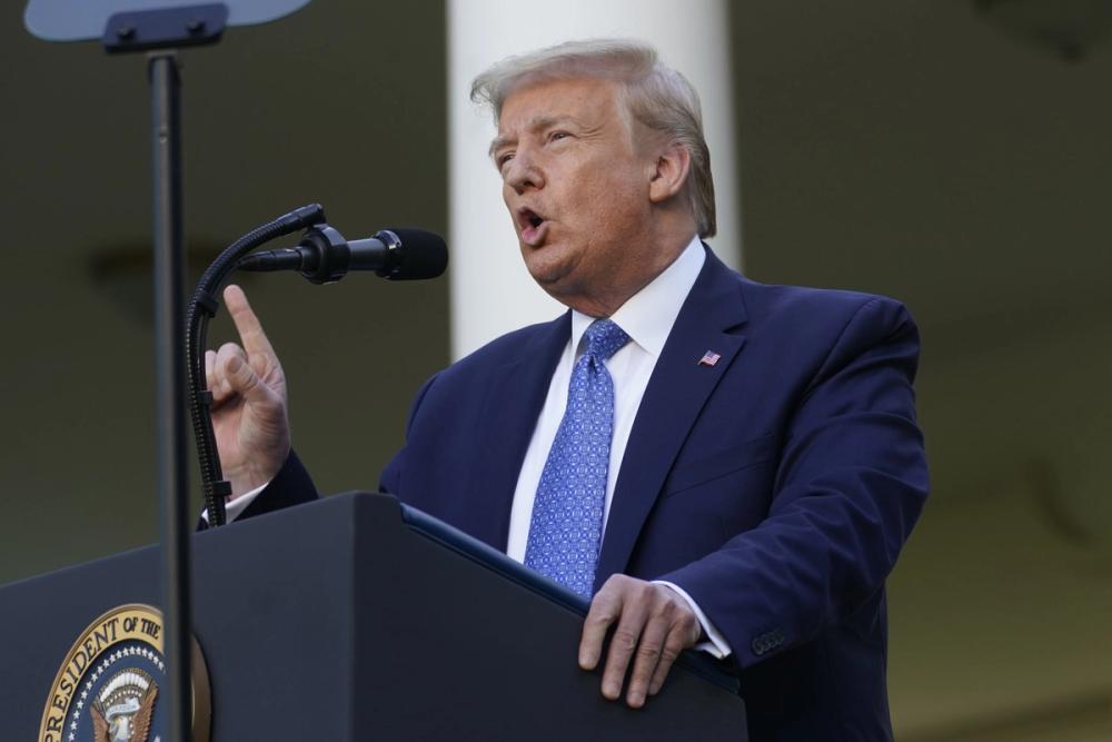 President Donald Trump speaking at a podium