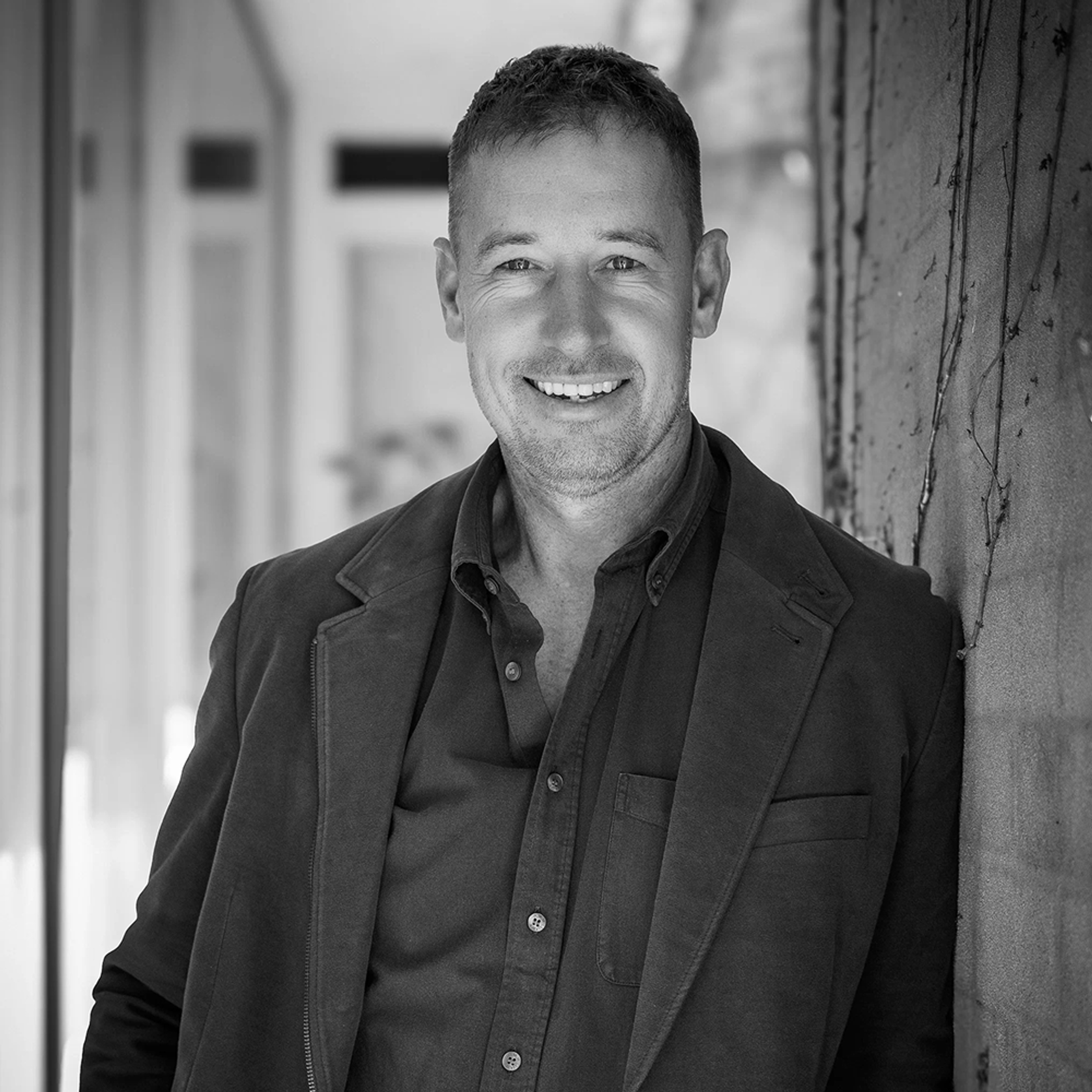 Black-and-white portrait of Evan Byrne, Managing Director of Pinnacl