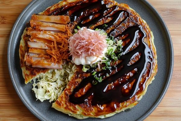 Japanese Okonomiyaki with Crispy Pork Belly and Cabbage