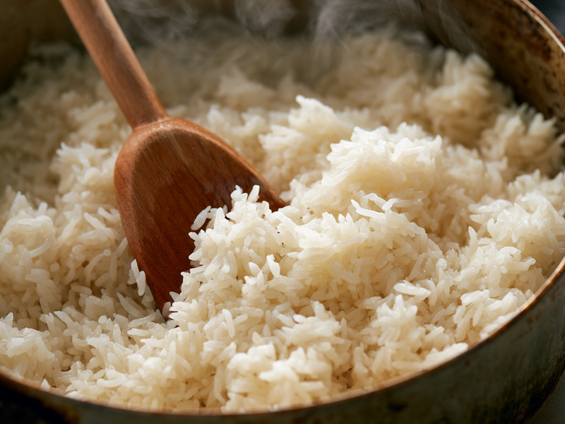 Fluffy cooked jasmine rice ready for Korean gochujang beef bowls.