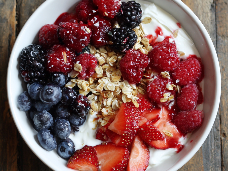 Drizzle honey and add optional toppings like chia seeds or nuts.