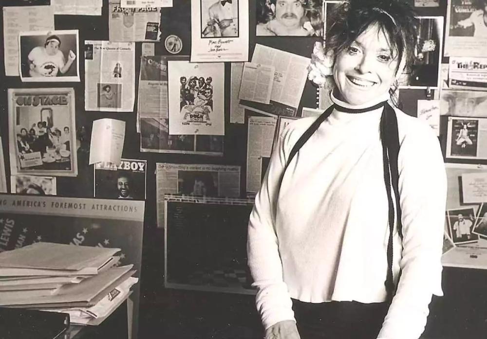 Photo of Mitzy Shore in her office.