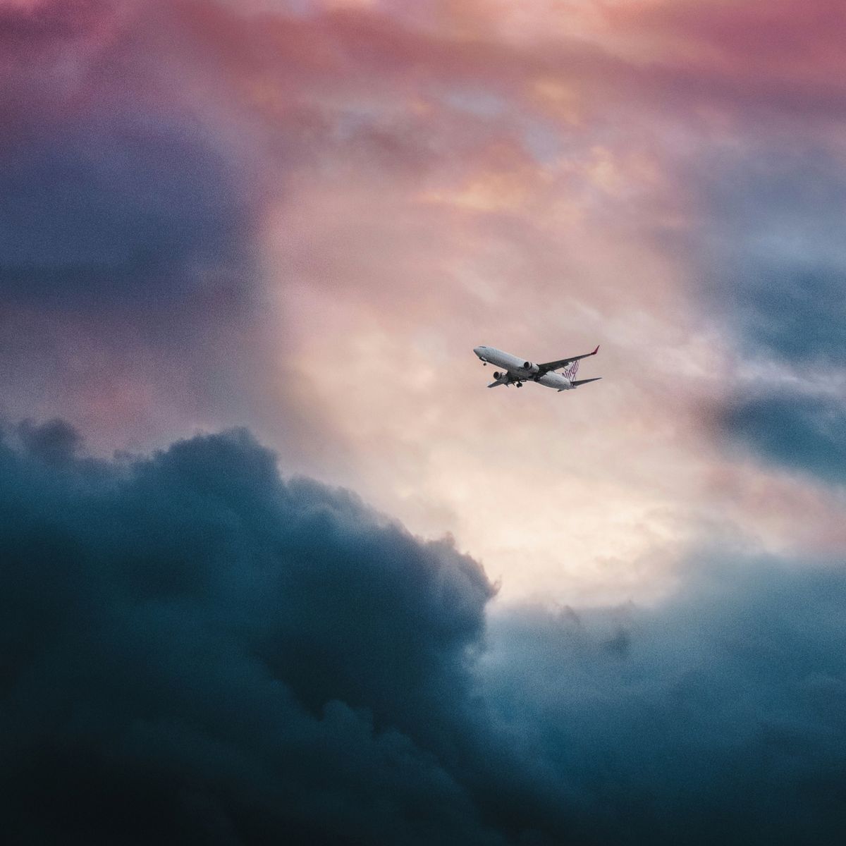 Plane flying through clouds