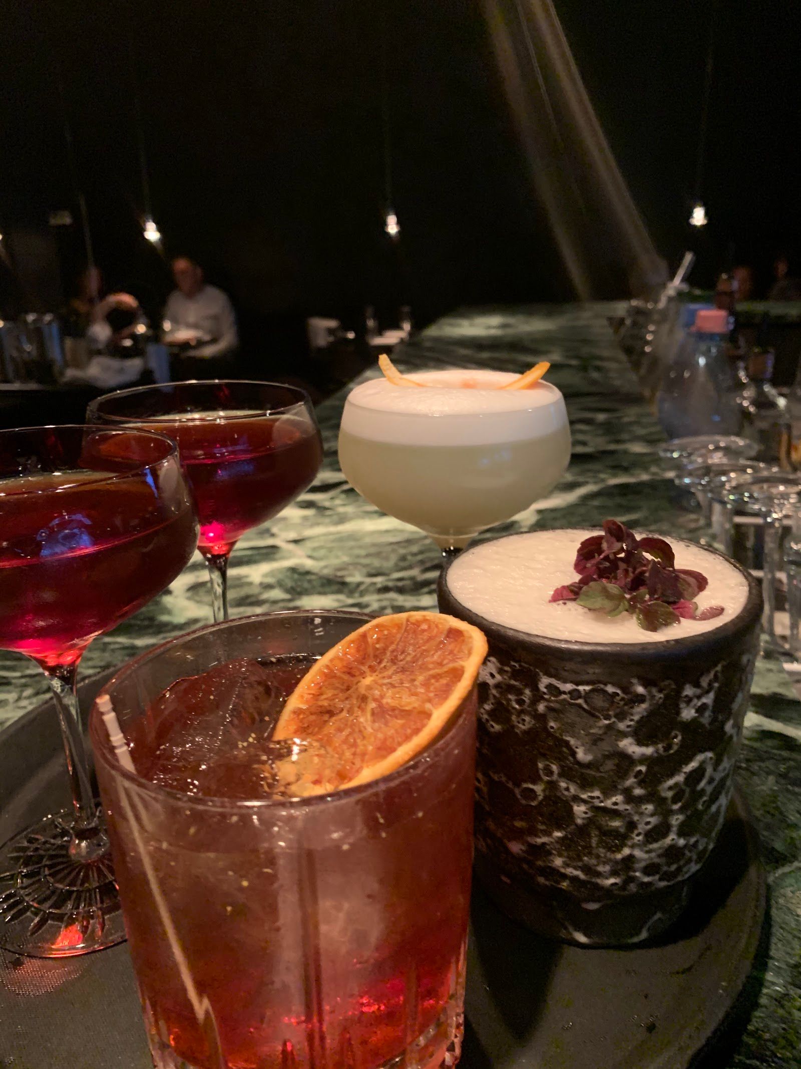 Cocktails on a marble counter at 893 Ryōtei