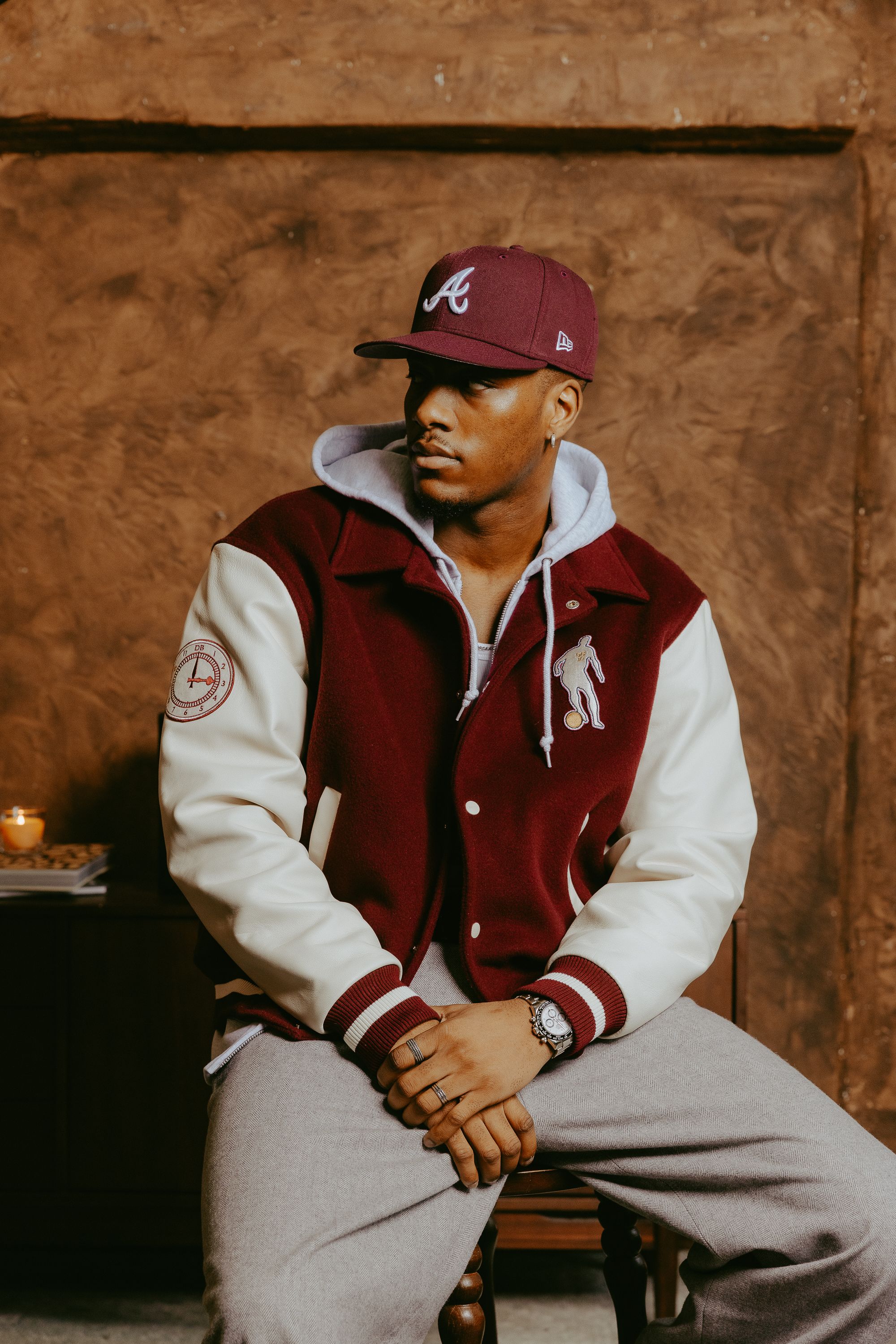 Editorial photo of model in jacket on a chair