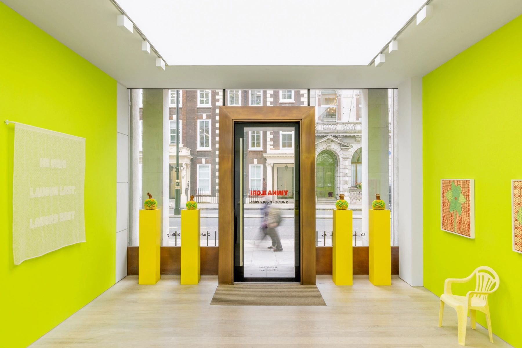 Photo of the entrance of the Cristea Roberts Gallery with Yinka's pieces on display.