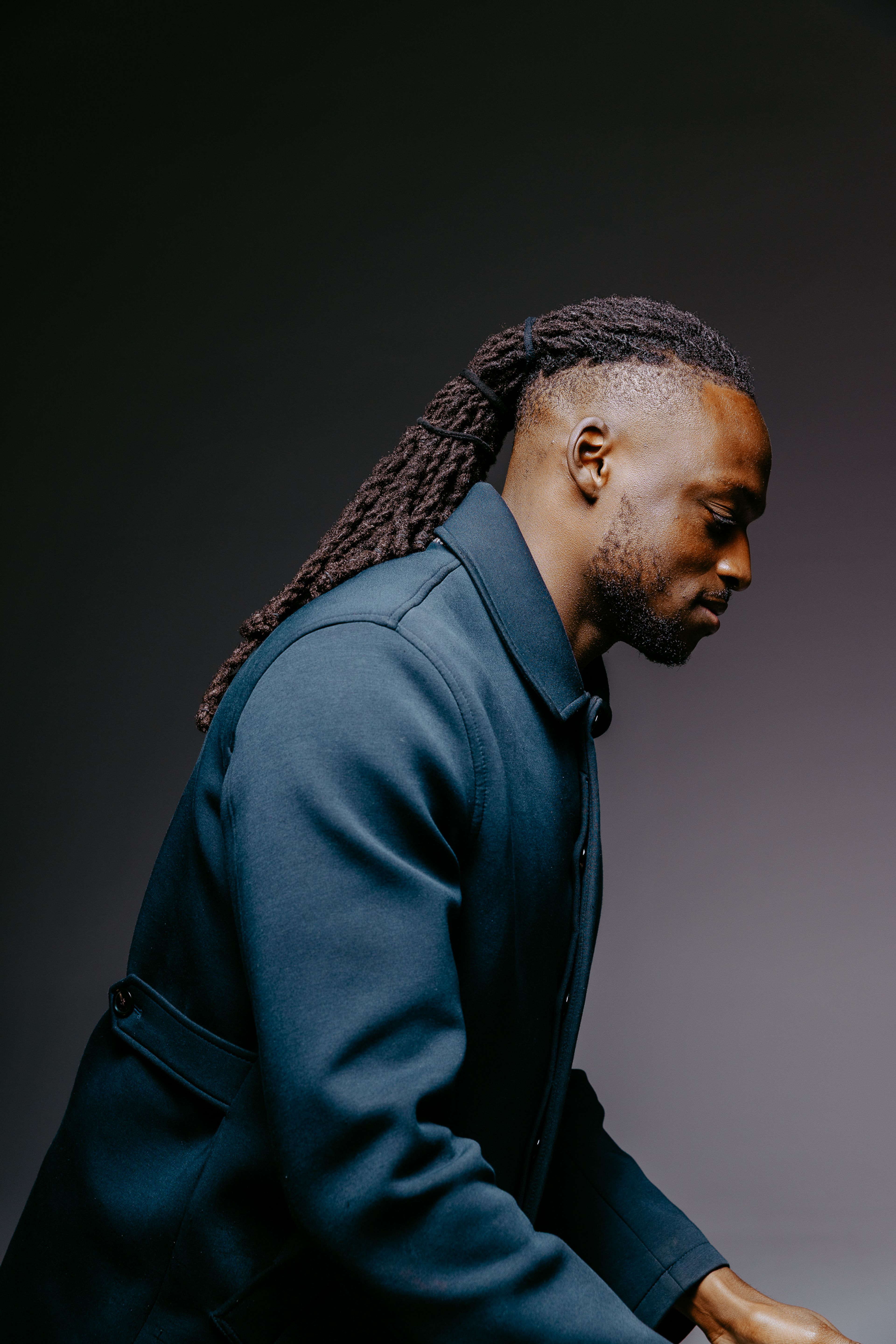 A photo of Dafs moving equipment on a shoot. 