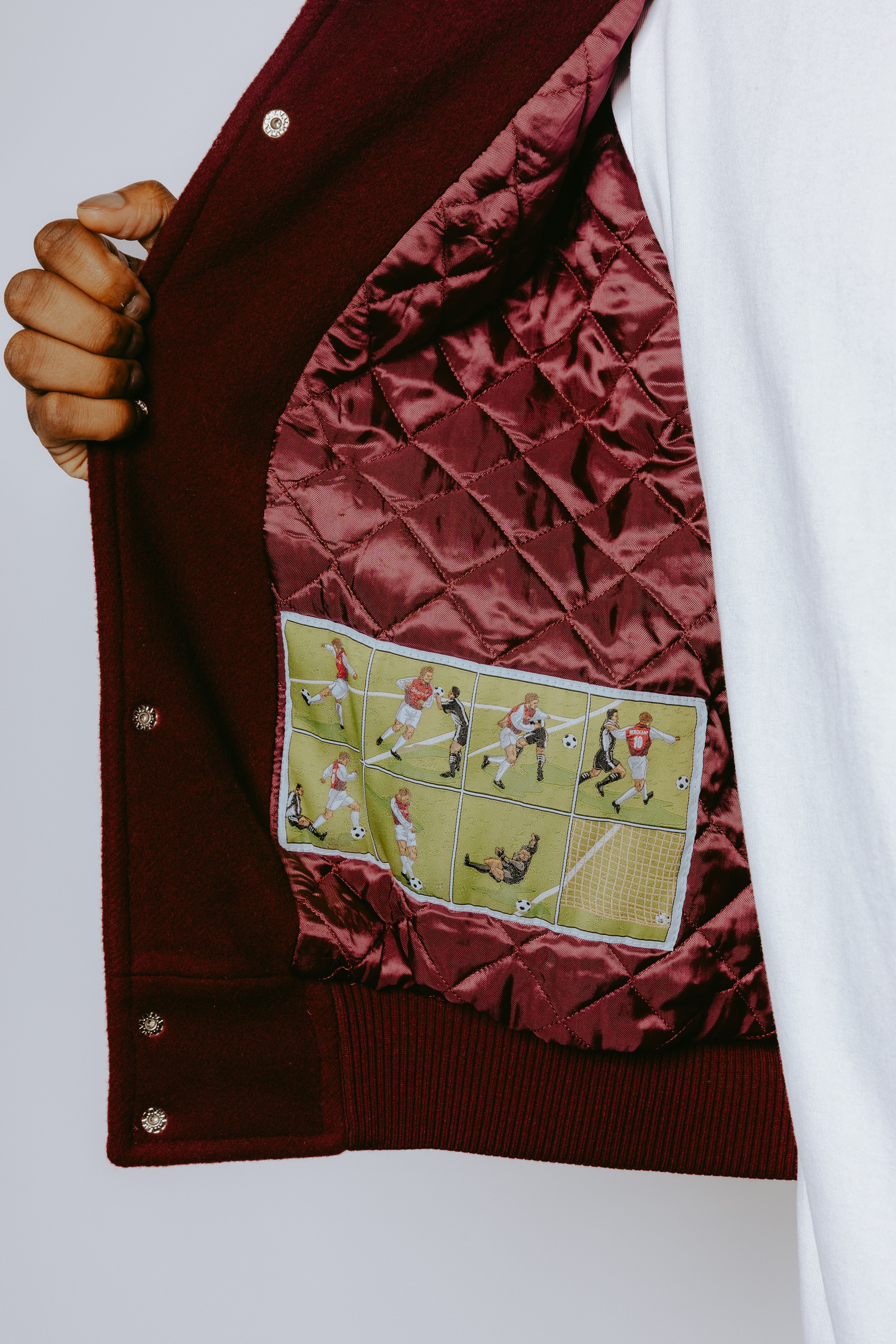 Detail shot showing illustrated patch inside of jacket