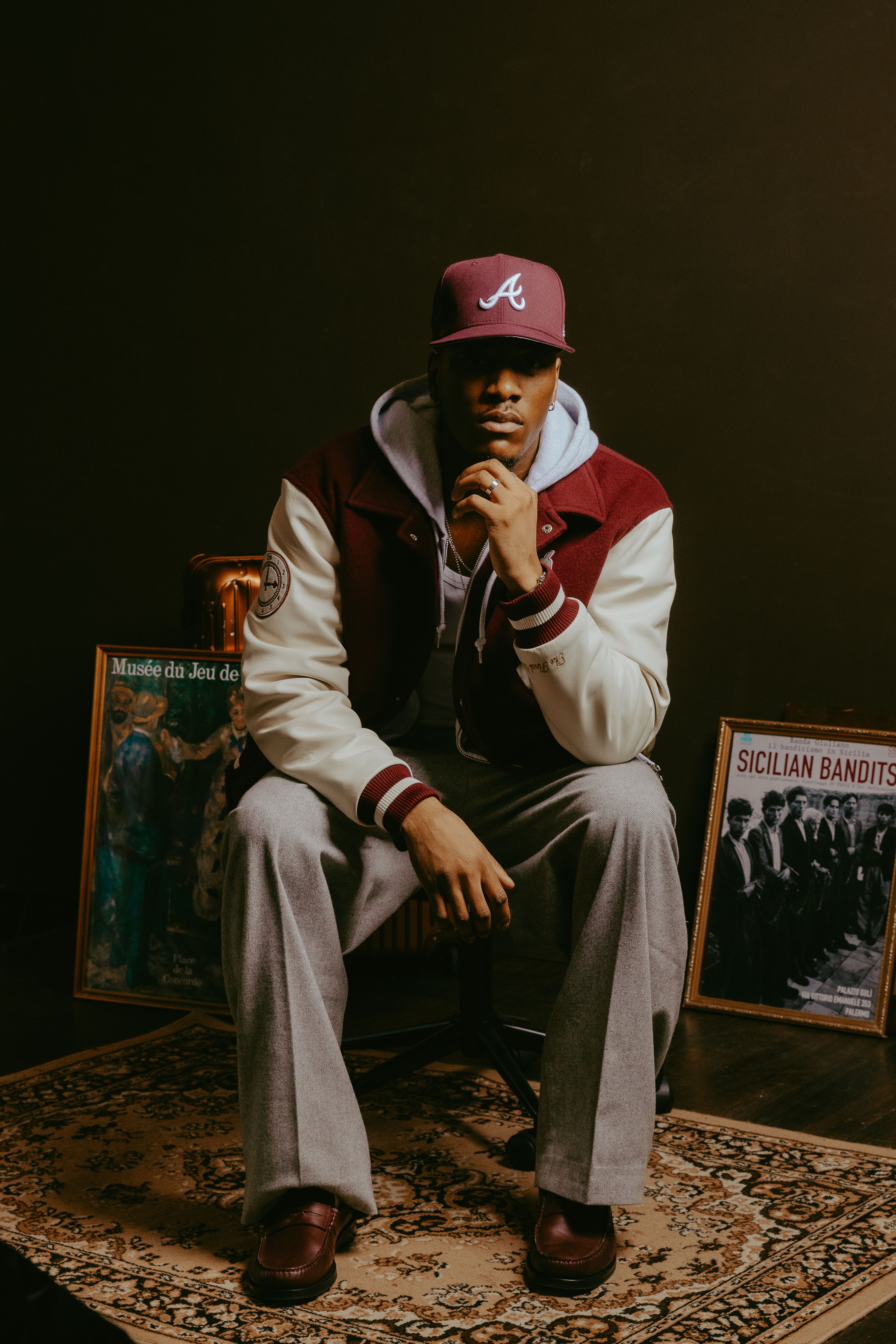 Editorial photo of model sitting down