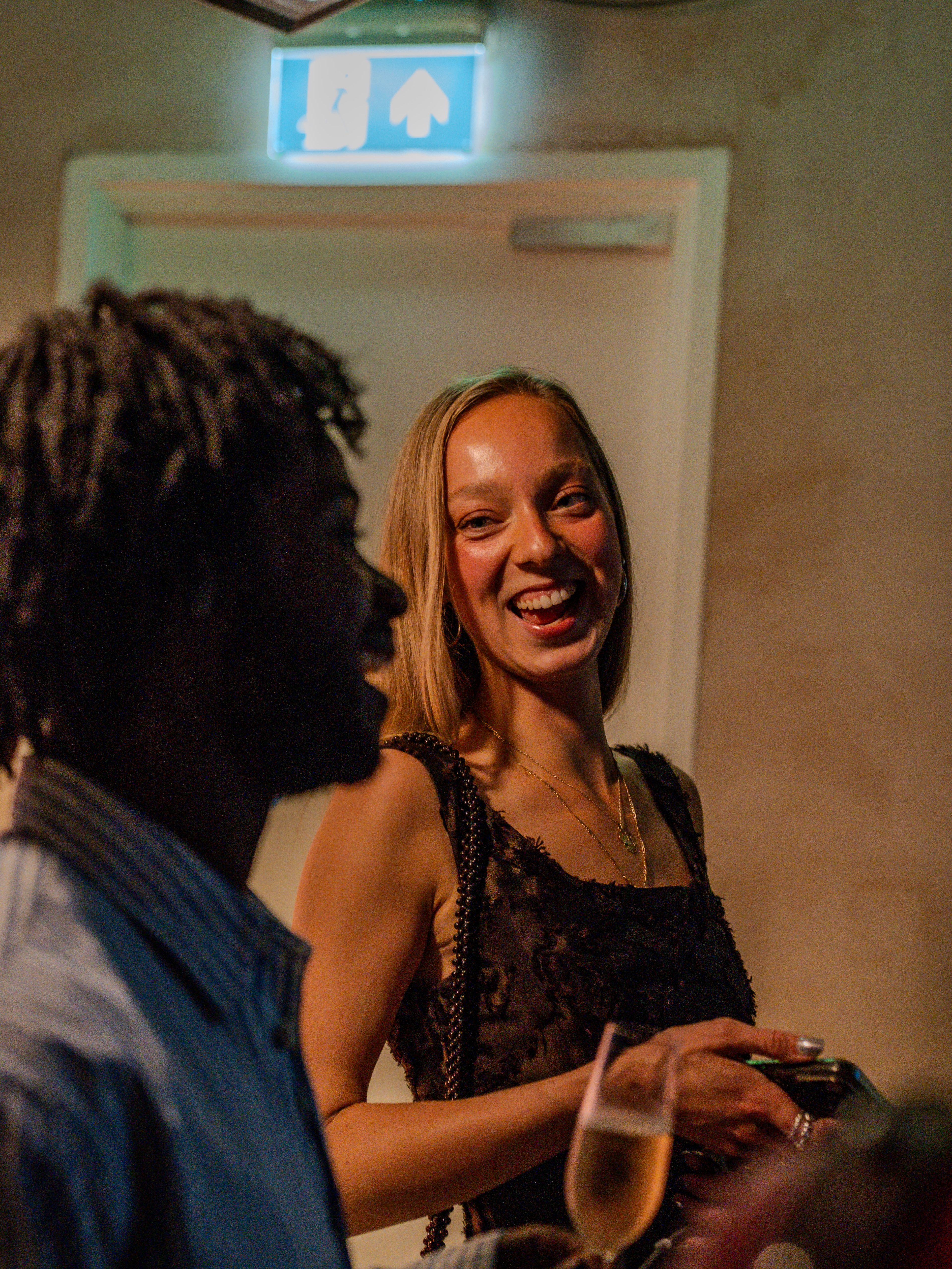 Guests smiling at the event
