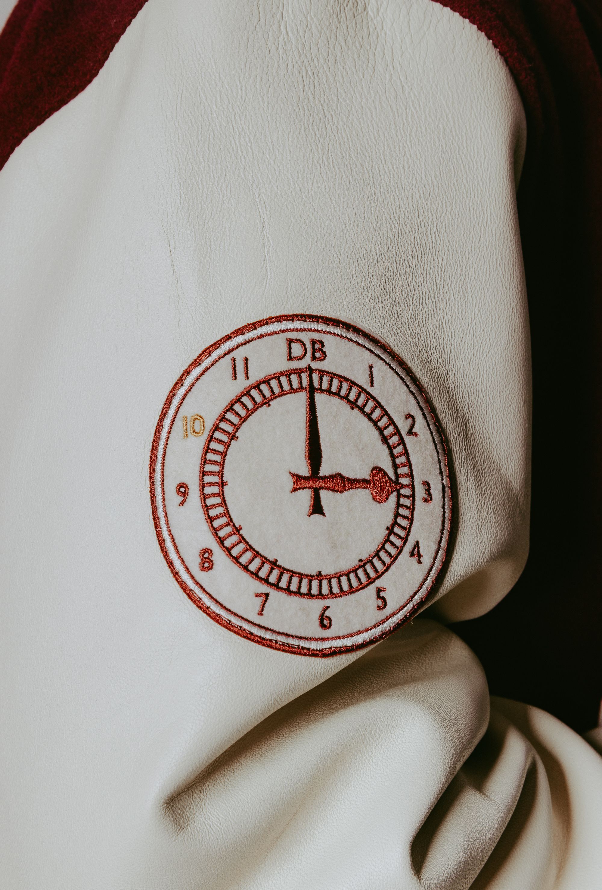 Photo of clock style patch on jacket arm