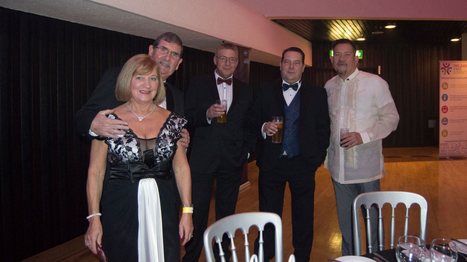 Guests gathered beside the tables