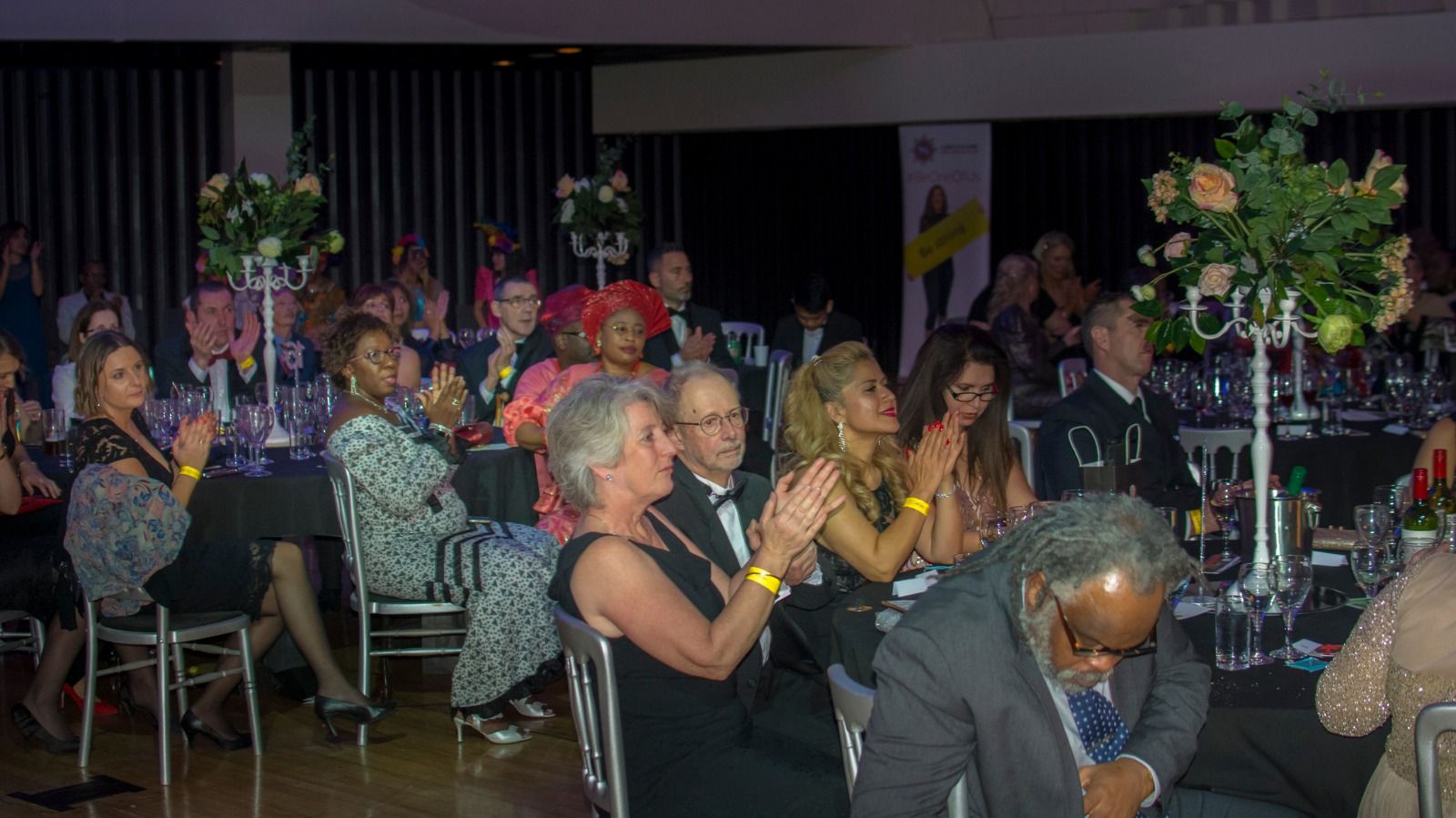Guests at their tables during the dinner